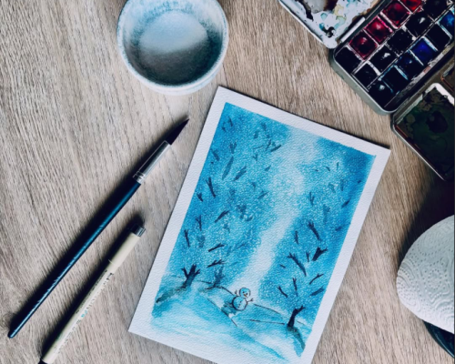 Foto van een aquarelschildering met een winterlandschap door a Girl in the Field